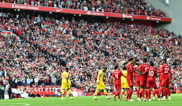 Liverpool FC players on the pitch at Anfield
